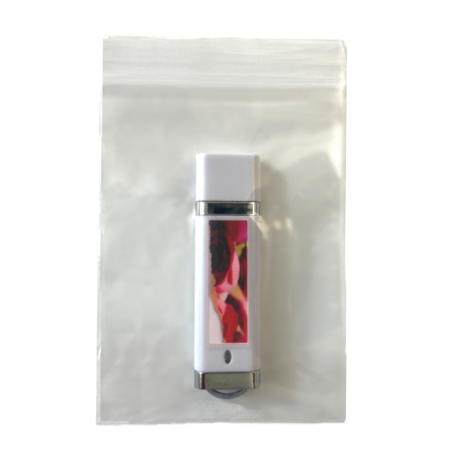 USB flash drive placed in clear resealable sleeve